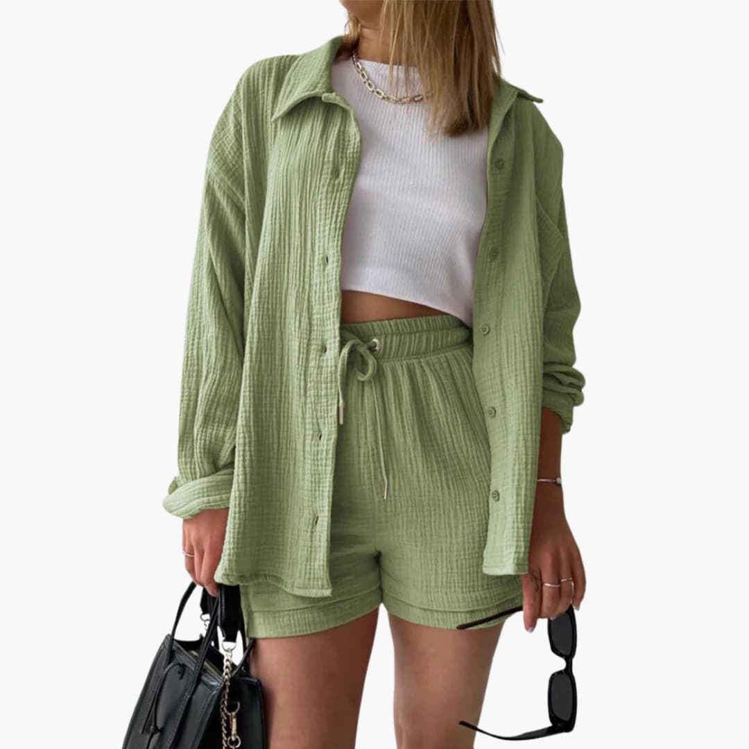 Women's matching three-piece casual set: stylish button-down shirt, sleeveless crop, and high-waist shorts.