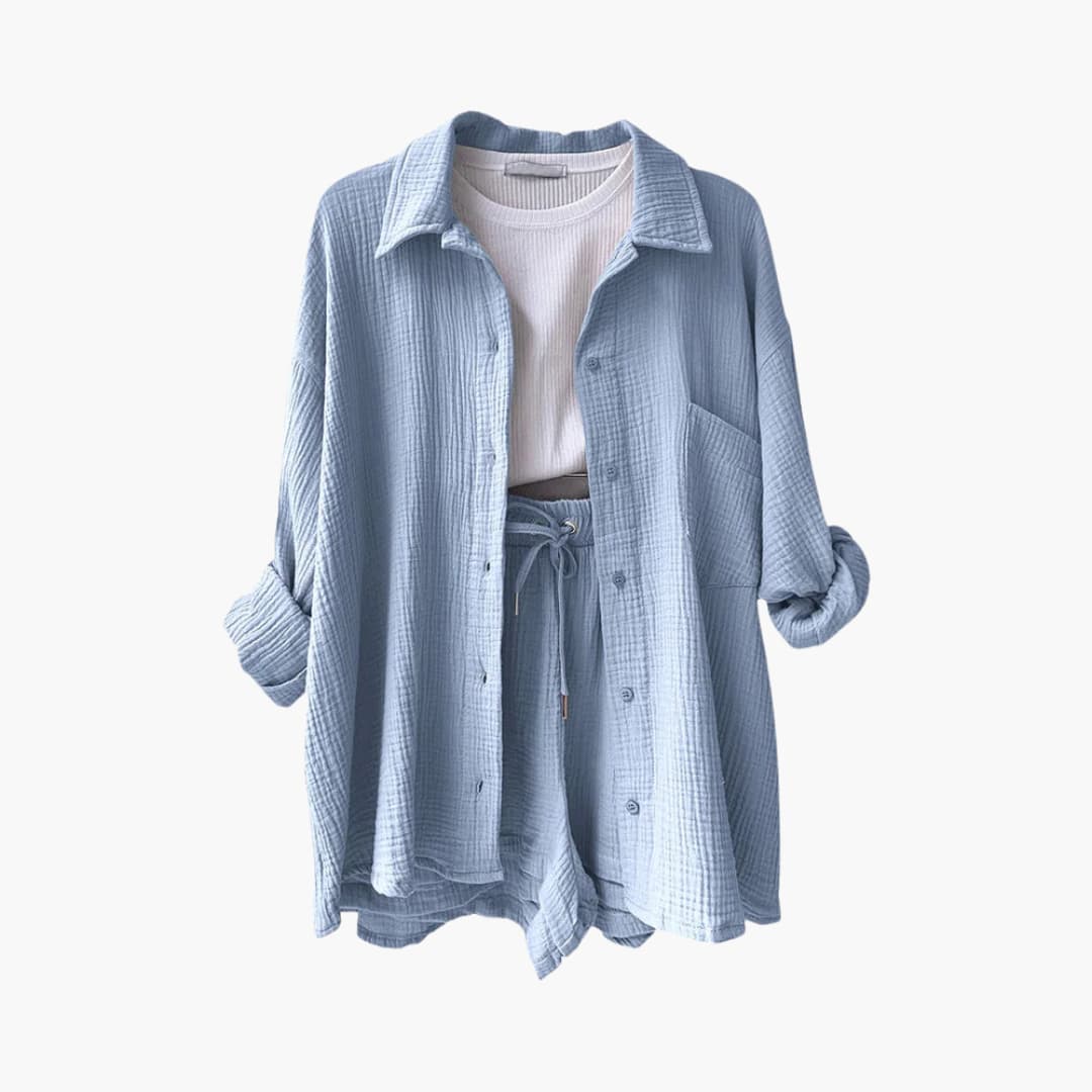 Elegant women's three-piece set for summer: button shirt, crop top & high-waisted shorts. Versatile style.