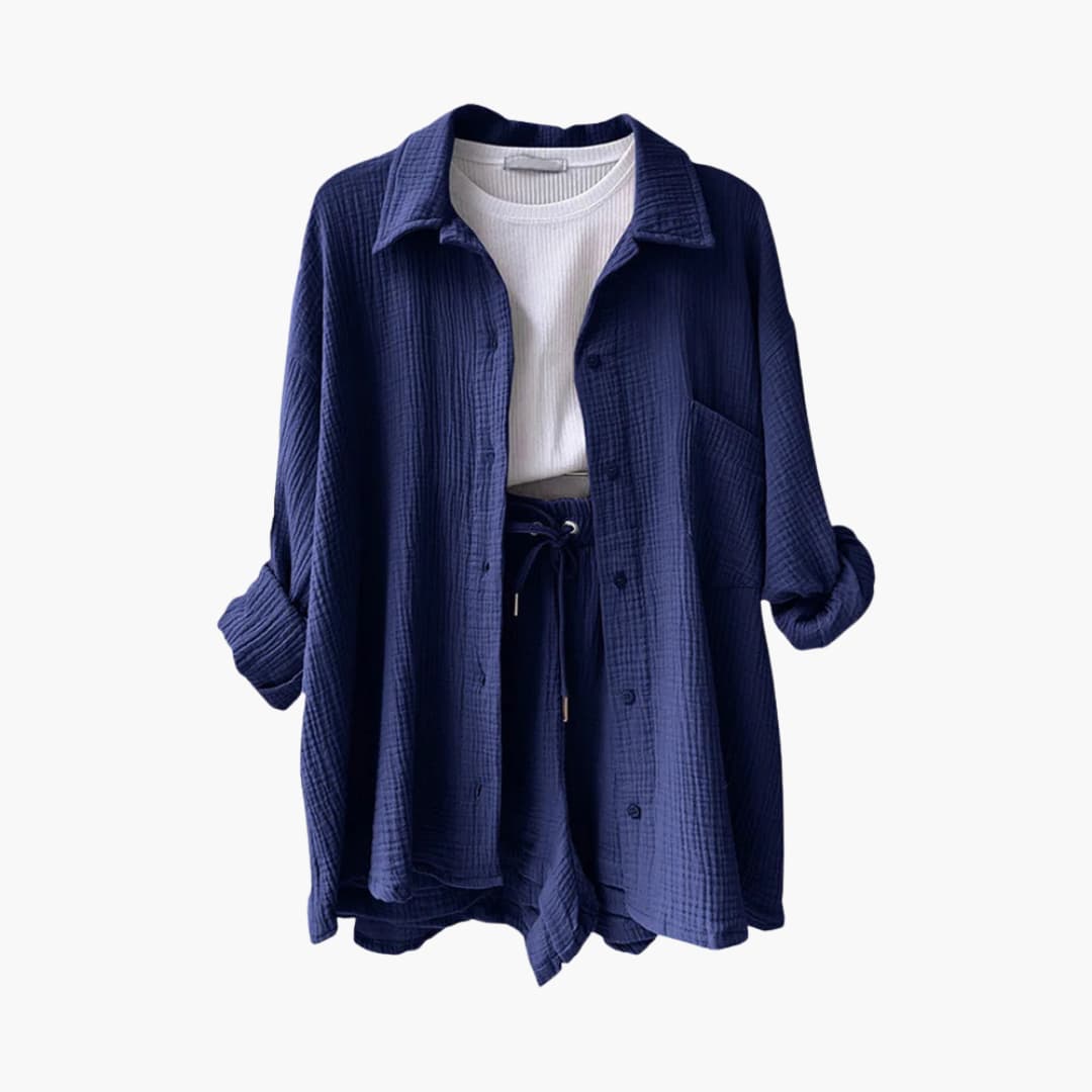 Women's casual three-piece outfit with a long-sleeve shirt, cropped top, and elastic waist shorts.