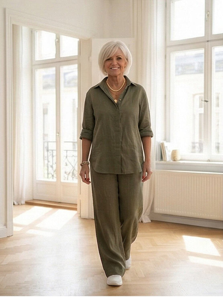 Neutral-toned women's lounge set: button-down shirt & wide-leg pants. Casual comfort.