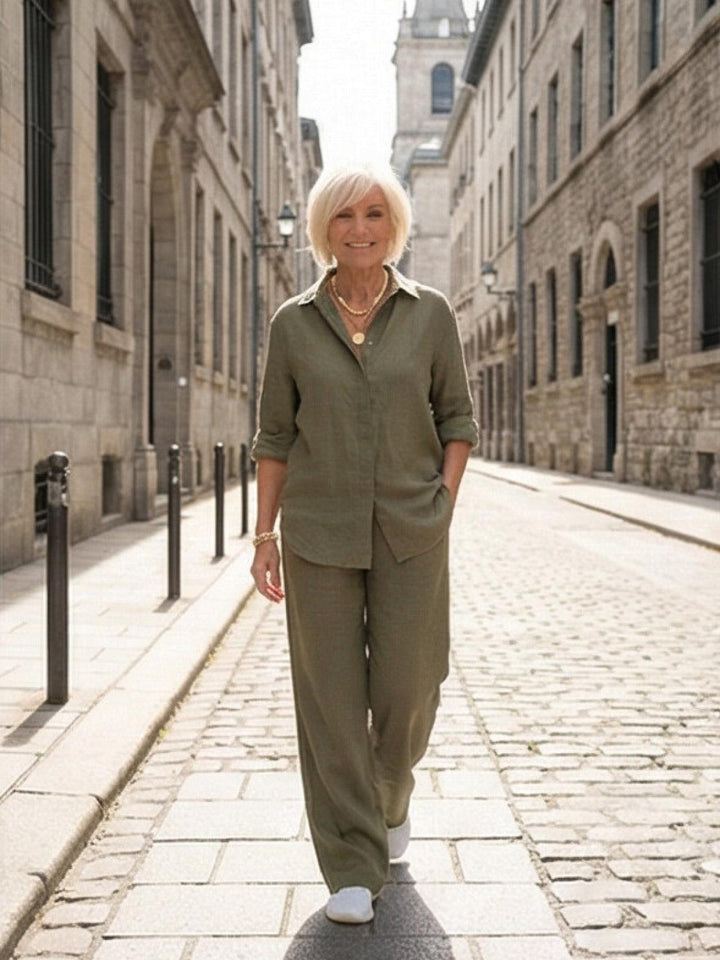Stylish women's button-down shirt, part of a comfortable two-piece wide-leg pants set.