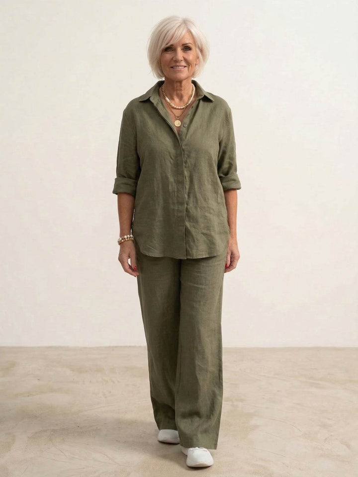 Elegant women's matching set with button-down shirt & wide-leg trousers. Comfortable spring fashion.