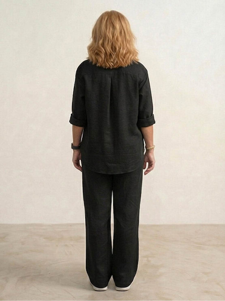 Sophisticated women's casual set: button-down shirt & wide-leg pants for versatile styling.