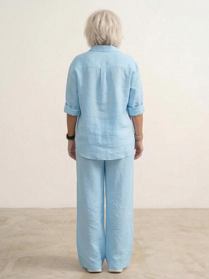 Pocket detail on women's wide-leg pants, part of a casual button-down matching set.