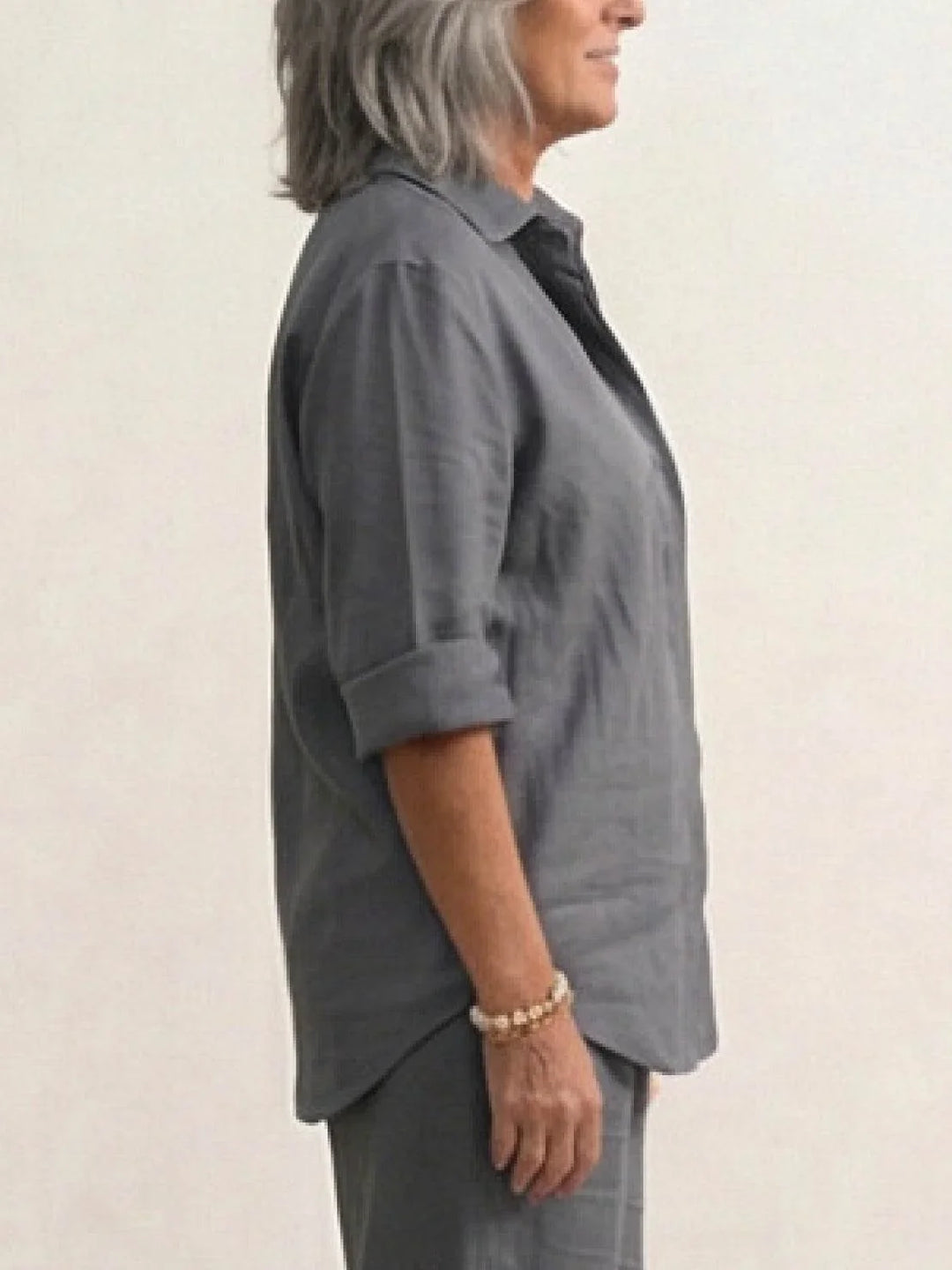 Chic and comfortable women's two-piece outfit: button-down shirt & wide-leg pants.