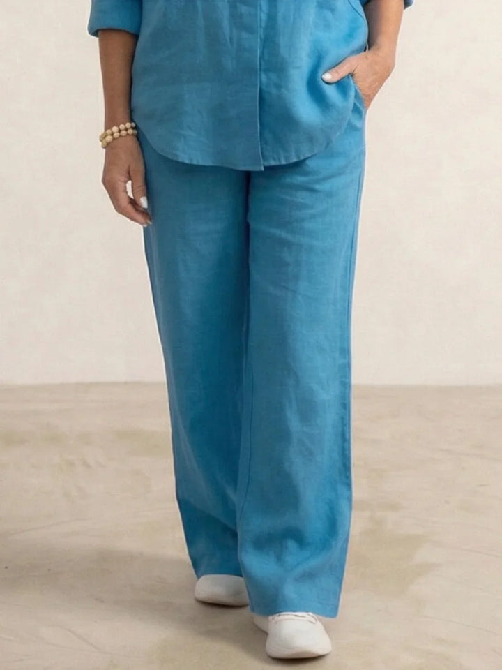 Perfect for brunch: women's two-piece button-down shirt & wide-leg pants matching set.