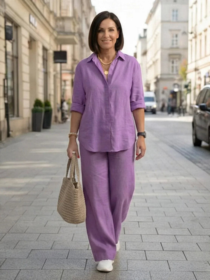 Matching top and bottom: women's stylish two-piece set with button-down & wide-leg pants.