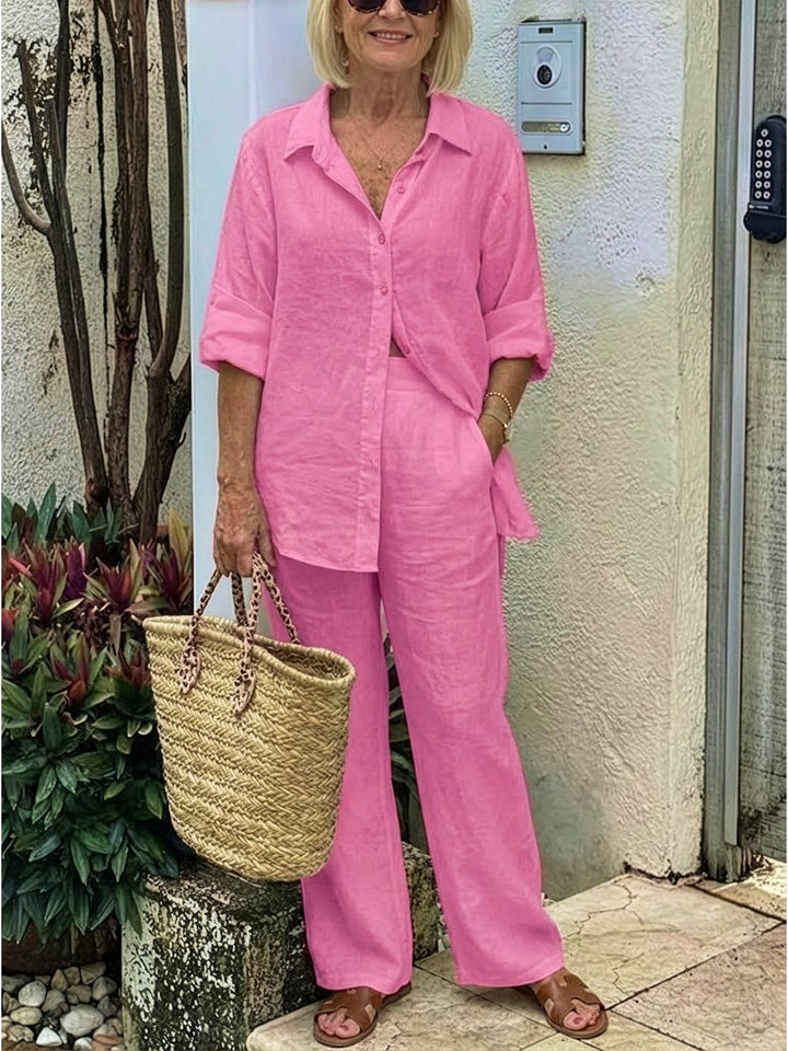 Relaxed yet elegant women's matching set: button-down top & flowy wide-leg pants.