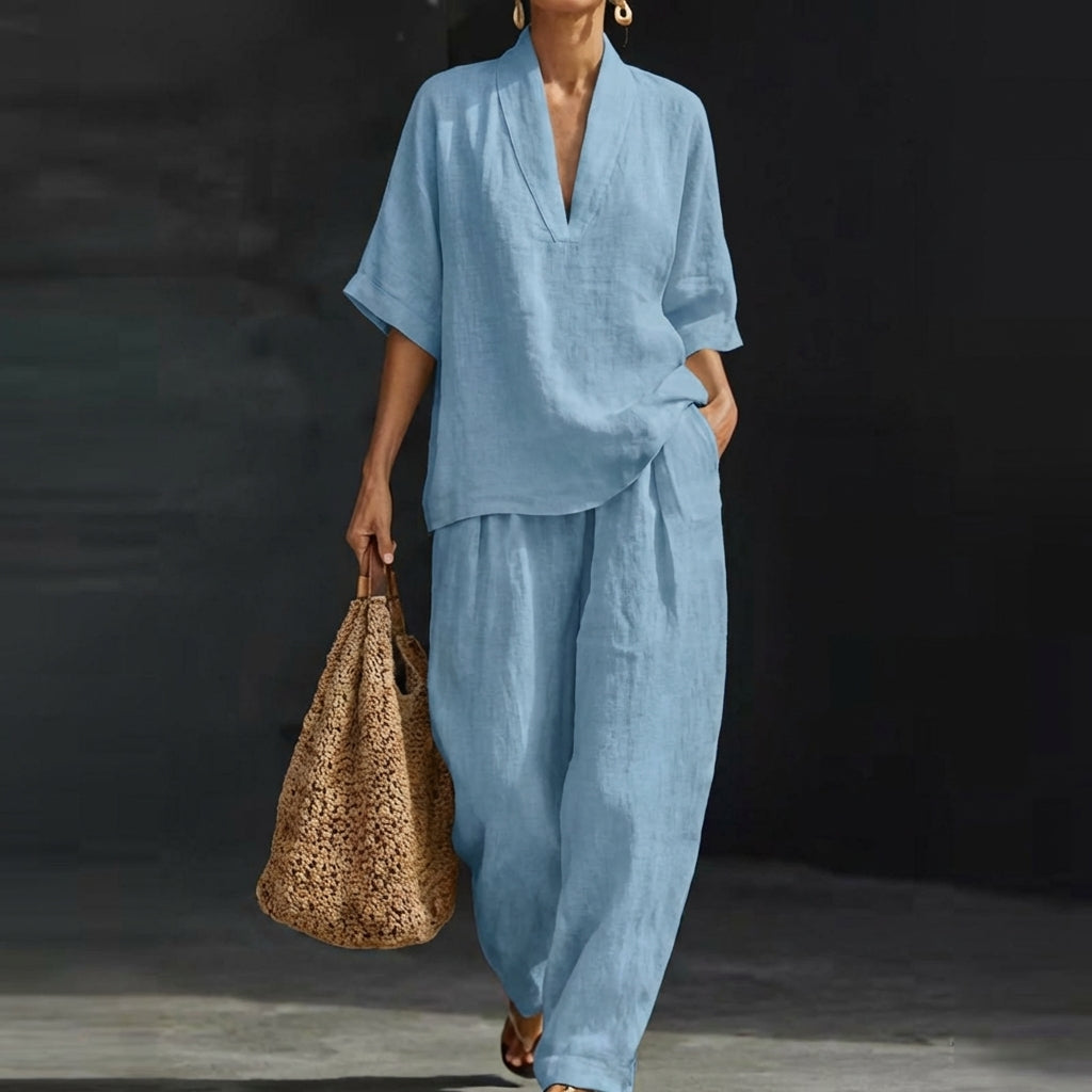 Women's casual two-piece summer set: stylish top & comfortable wide-leg pants. Perfect for warm weather fashion.