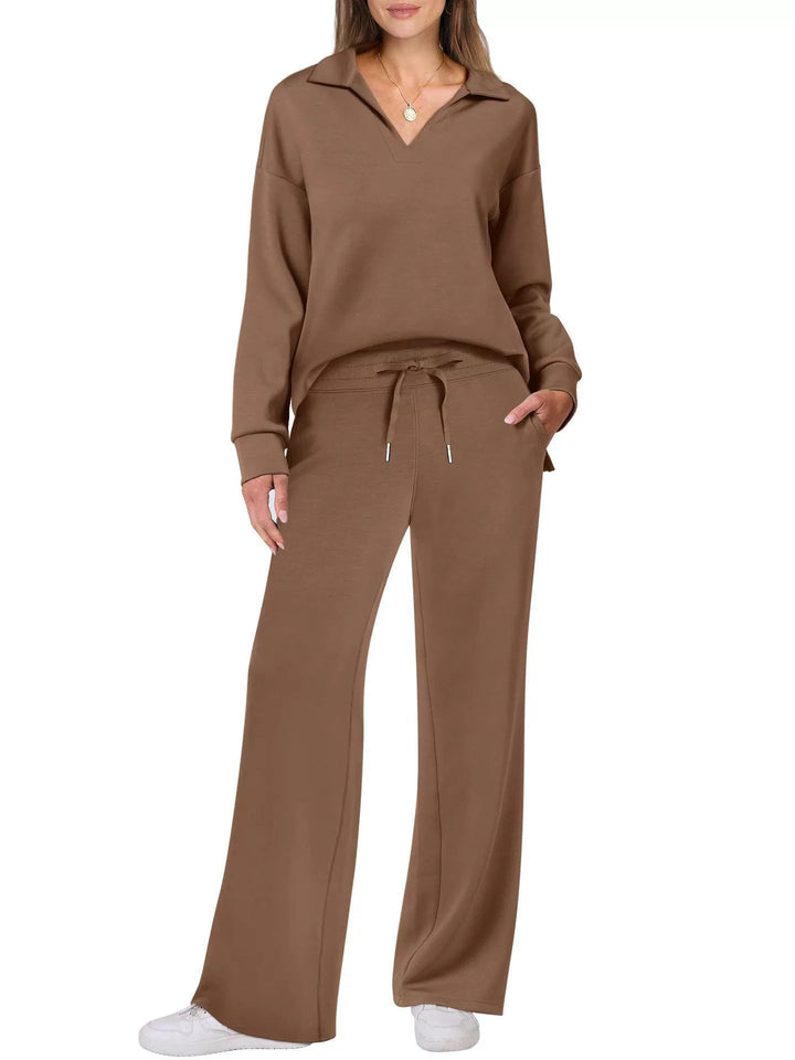 Chic women's two-piece matching set: zip-neck top & wide-leg pants. Effortless casual style and comfort.