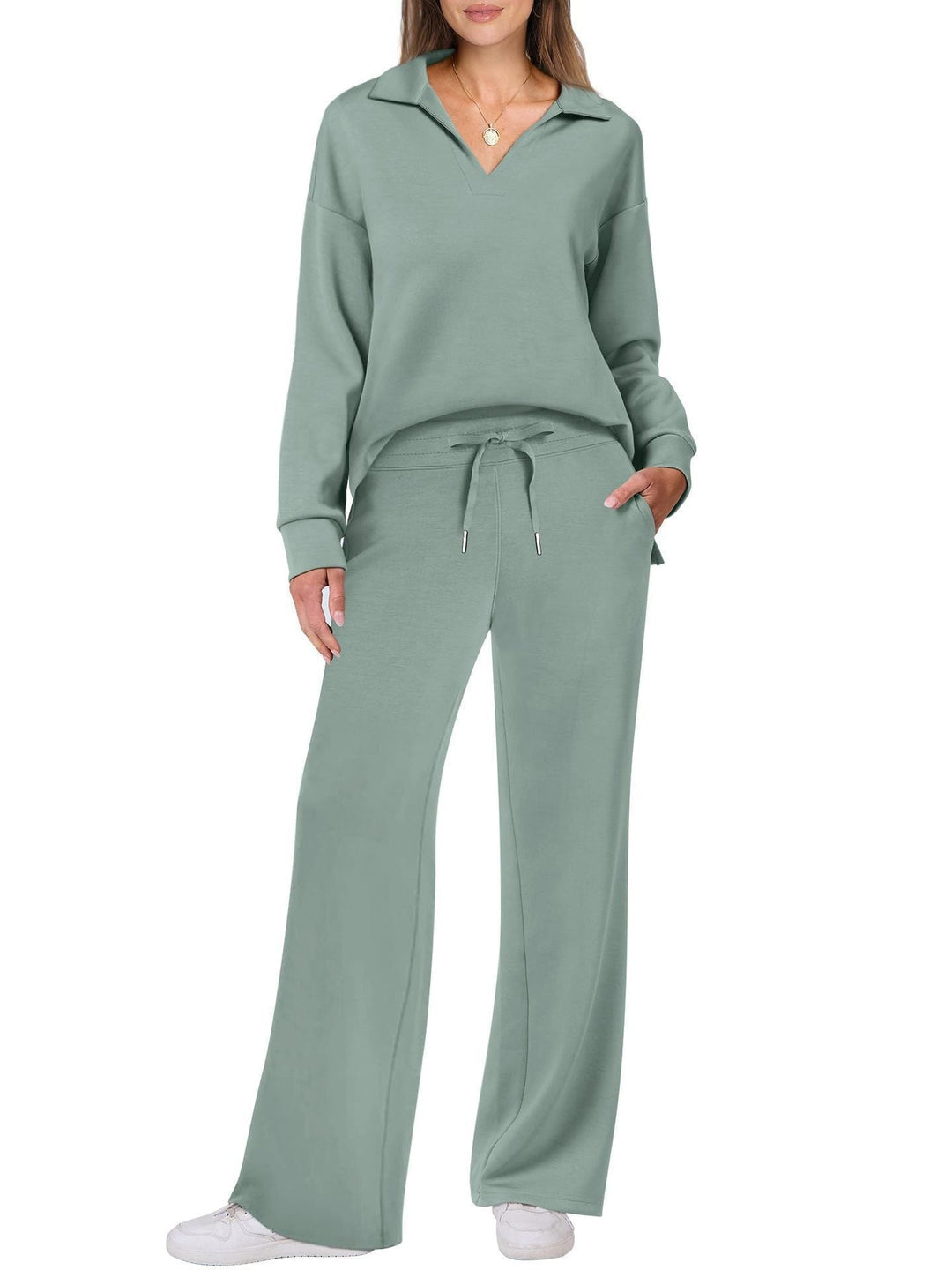 Simple & direct: Women's casual two-piece loungewear set with zip-neck top and comfortable wide-leg pants.