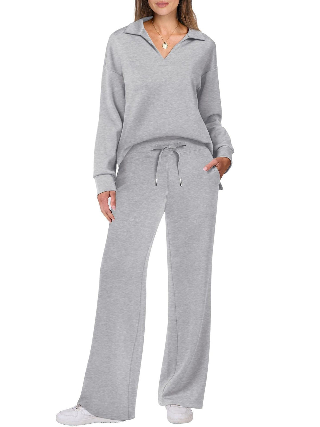Blue women's relaxed fit two-piece zip-neck top & wide-leg pants set. Casual comfort for home or out.
