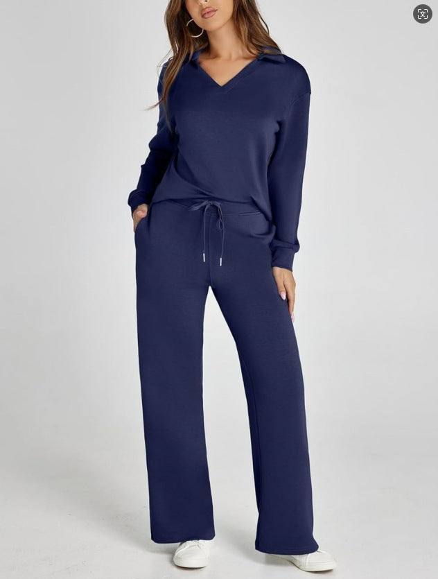 Women's wide-leg pants, part of a casual two-piece zip-neck top set. Stylish loungewear or comfy casual bottoms.