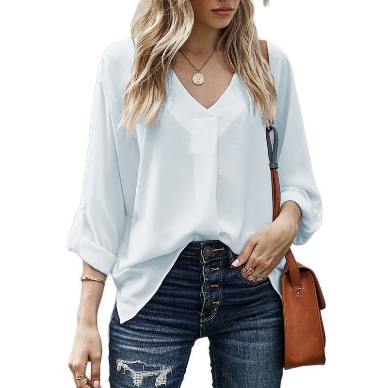 Lightweight women's V-neck blouse, ideal for summer casual and office outfits. Effortlessly stylish.