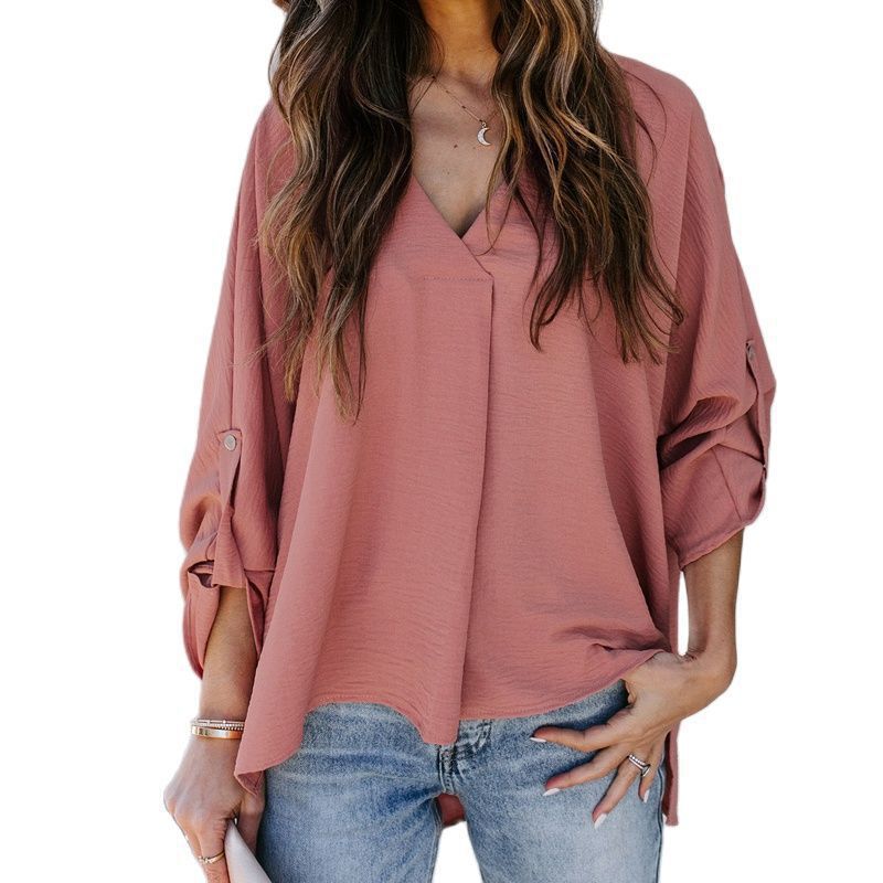 Versatile women's V-neck top, suitable for both office casual and elegant everyday wear. Comfortable blouse.