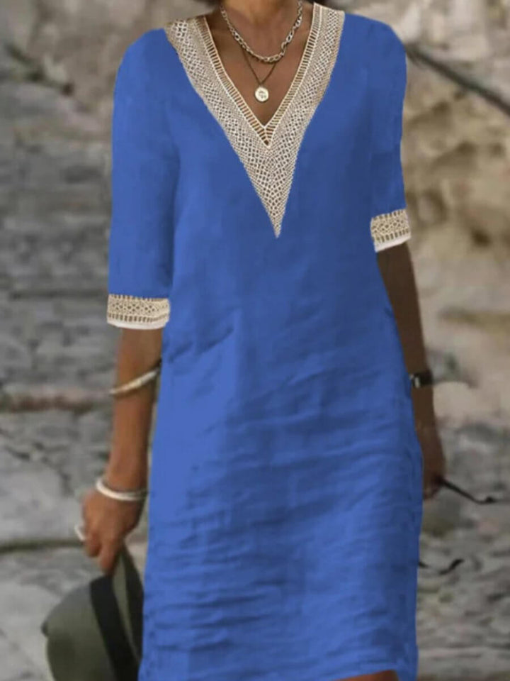 Women's casual V-neck midi dress, perfect for comfortable summer days and versatile everyday style.
