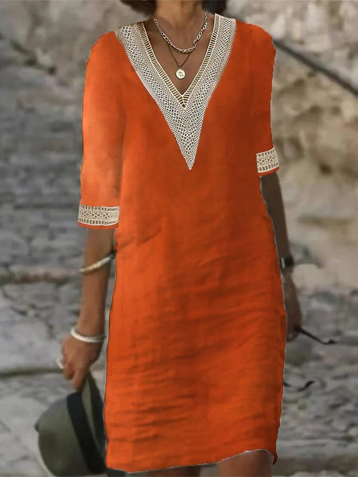 Effortless style: women's casual V-neck midi dress, perfect for everyday elegance and comfort.