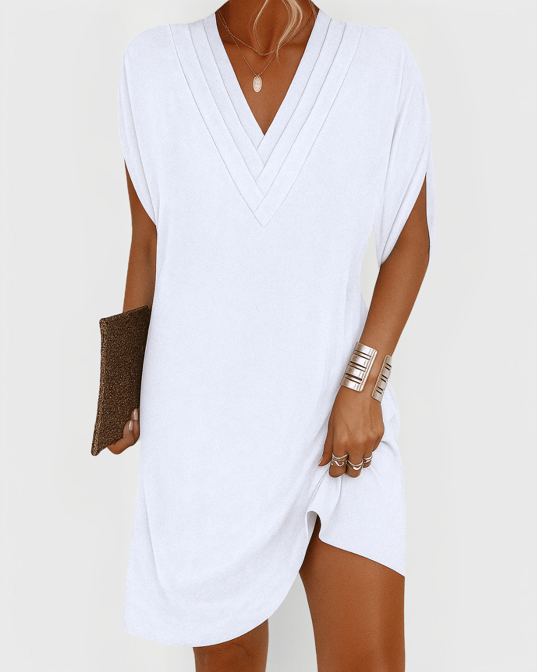 Versatile women's V-neck mini dress, styled for casual summer days. Comfortable & stylish short dress.