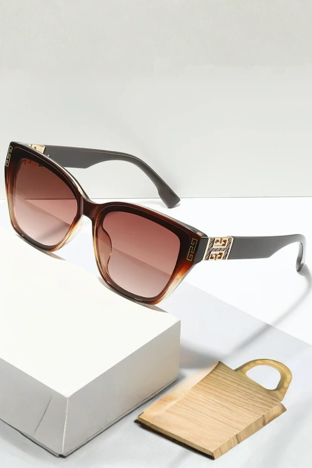 Female cat eye sunglasses, gold detail frames, gradient lenses, 100% UV protection eyewear.