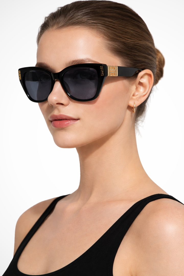 Trendy women's cat eye sunglasses, gold accent, gradient lenses, chic fashion accessory for style.