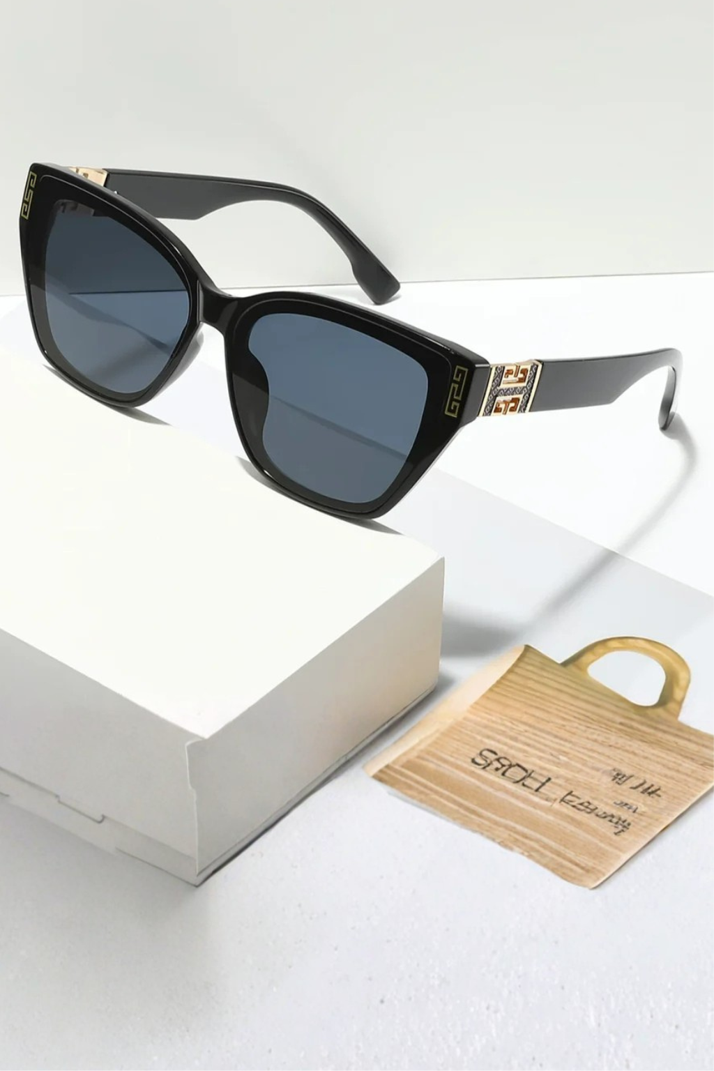 Women's fashionable cat eye sunglasses, gold accent, gradient lenses, UV protection eyewear.