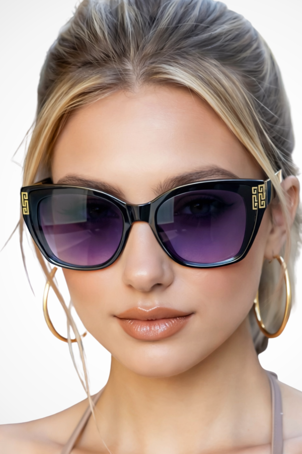 Stylish women's cat eye sunglasses with gold trim, a must-have fashion eyewear accessory.
