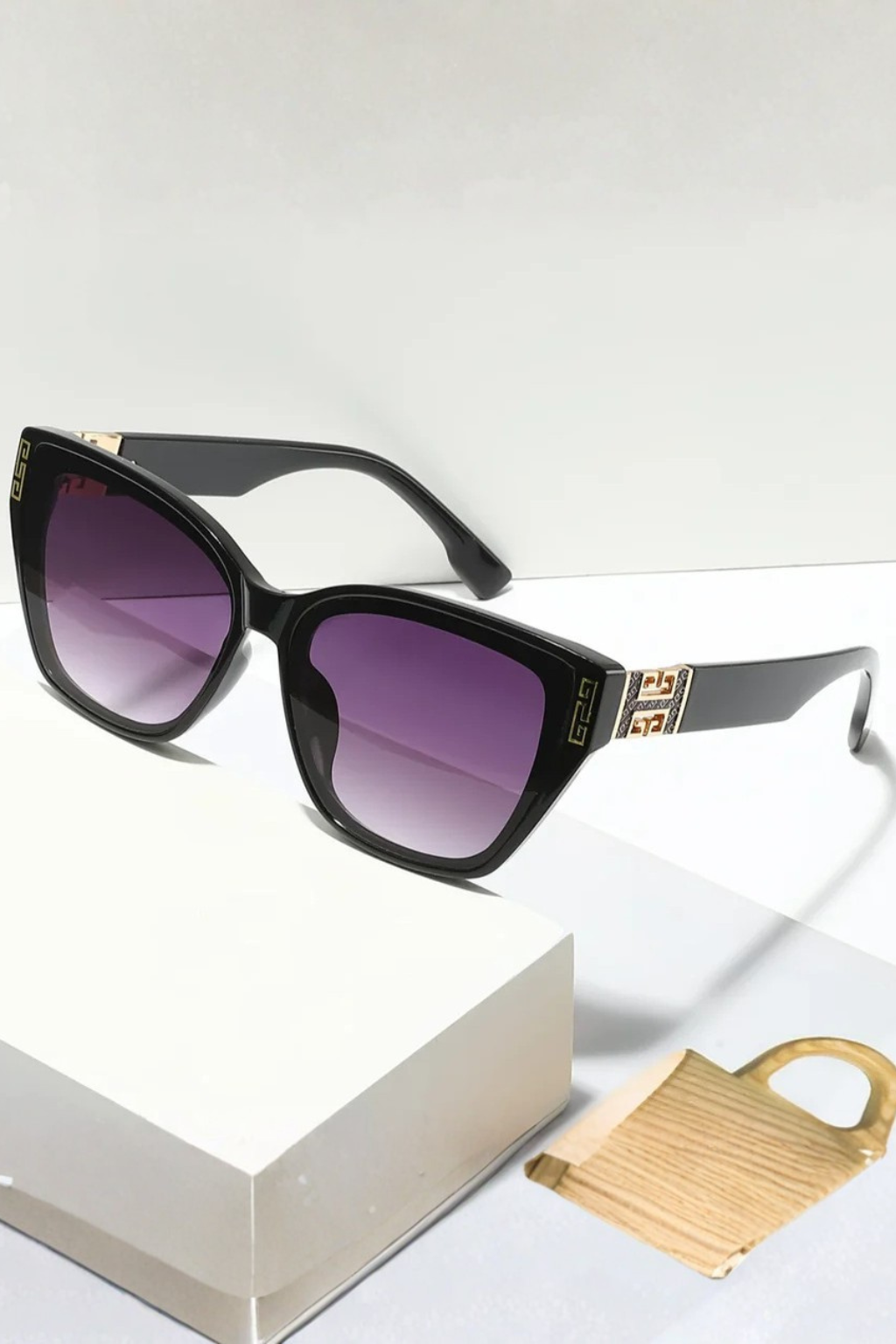 UV protected women's cat eye sunglasses, gold accent, gradient lenses for eye safety and style.