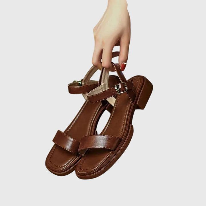 Supportive Celestia comfort sandals for women, featuring a stylish block heel and cushioned footbed.
