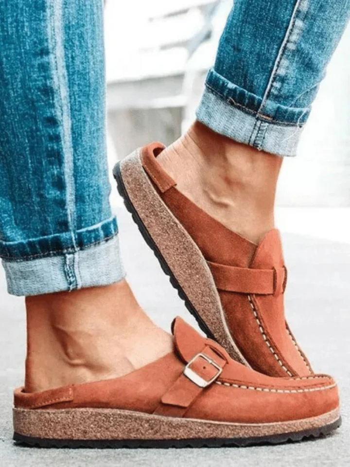 Stylish Charlotte buckle comfort clogs for women, close-up showing quality, comfortable slip-on design.