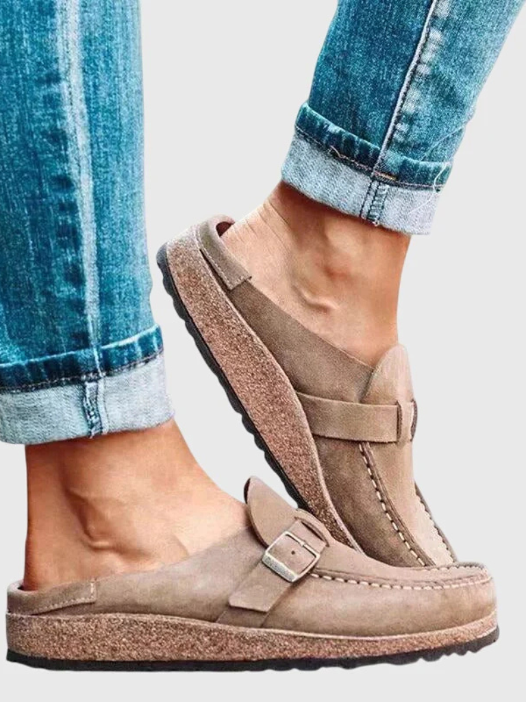 Side view of women's Charlotte buckle clogs, highlighting ergonomic comfort & trendy design for daily wear.