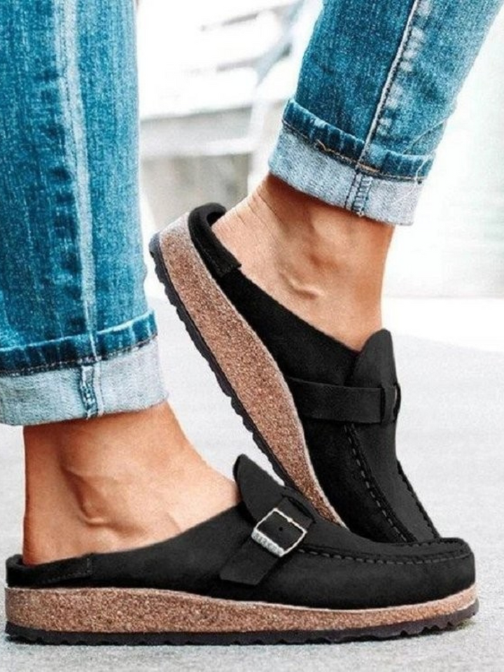 Fashionable women's Charlotte buckle comfort clogs, a chic and supportive choice for spring & summer.