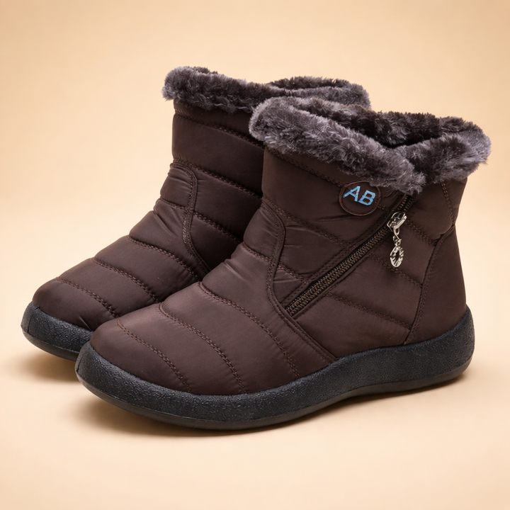 Durable sole of the women's Charlotte slip-on boots, designed for winter traction.