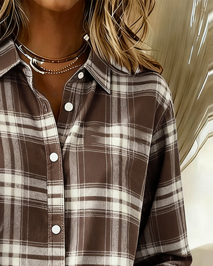 Detailed shot of the checked fabric on a women's long sleeve top, perfect for autumn wear.