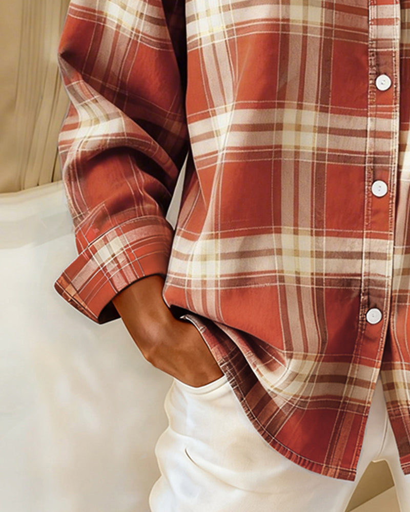 Back view of a women's long sleeve patterned shirt, emphasizing its casual appeal.