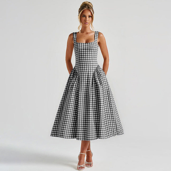 Graceful women's midi dress in a checkered pattern, designed with an elegant square neck & princess fit.