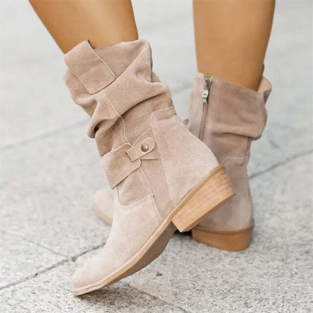 Versatile women's slouch ankle boots with elegant buckle. Low heel, ideal casual footwear for fall & winter style.