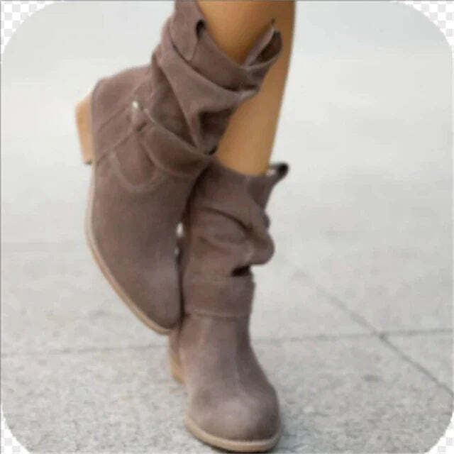 Chic women's ankle boots: slouchy design, decorative buckle, comfortable low heel. Great for casual fall outfits.