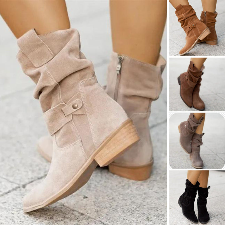 Women's stylish buckle ankle boots with a slouchy fit. Comfortable low heel, perfect for versatile fall/winter wear.