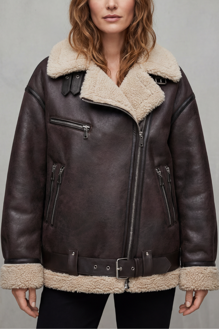 Women's chic belted aviator jacket. Stylish winter outerwear providing warmth and fashion.