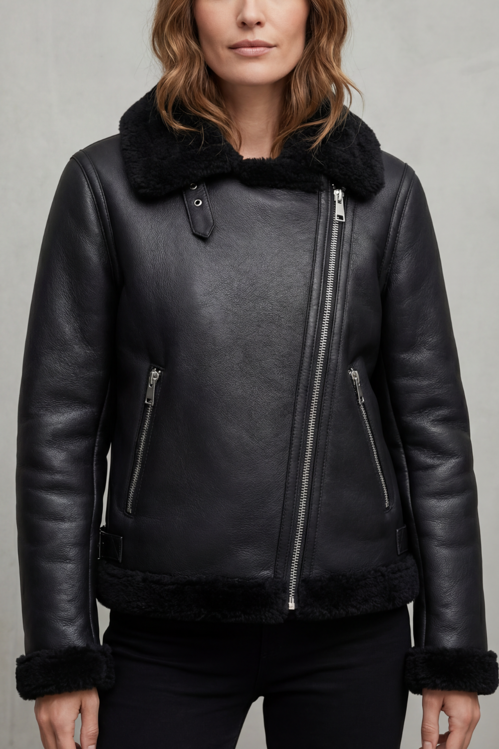 Women's chic black biker jacket with asymmetrical zip closure & edgy style. Versatile outerwear for women's fashion.
