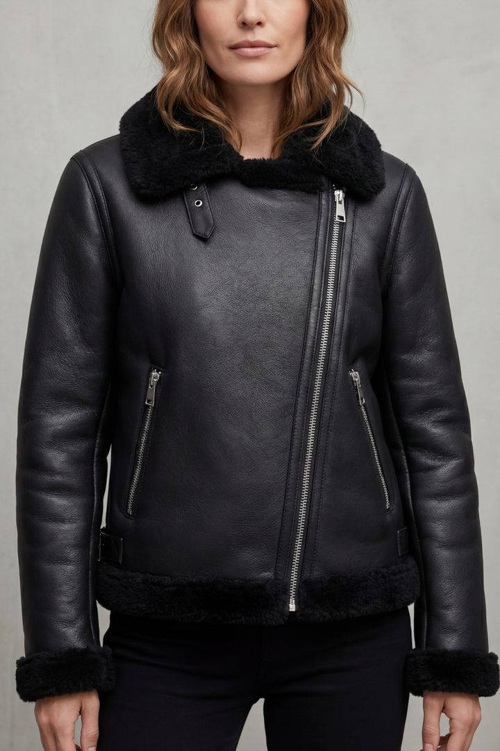 Women's chic black biker jacket with asymmetrical zip closure & edgy style. Versatile outerwear for women's fashion.