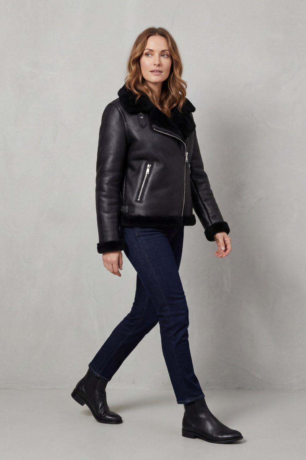 Versatile women's asymmetrical zip biker jacket in black. Edgy & stylish outerwear for winter fashion & apparel.
