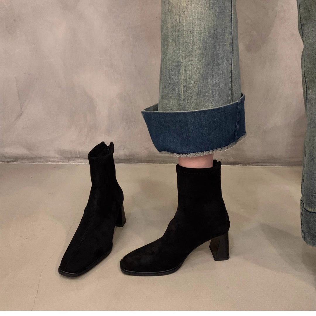 Chic women's pointed toe ankle boots featuring a sturdy block heel. Versatile and comfortable for daily wear or dress occasions.