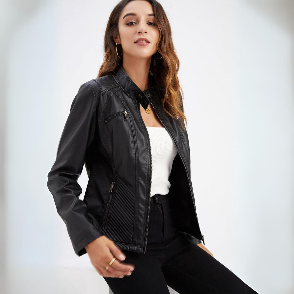 Women's chic black moto jacket, slim fit, with zipper details. Trendy biker style outerwear for versatile fashion.