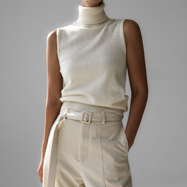 Women's chic black turtleneck sweater, cozy knitwear for winter fashion.