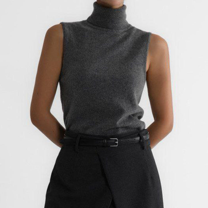 Close-up of soft women's turtleneck knitwear, highlighting cozy texture.