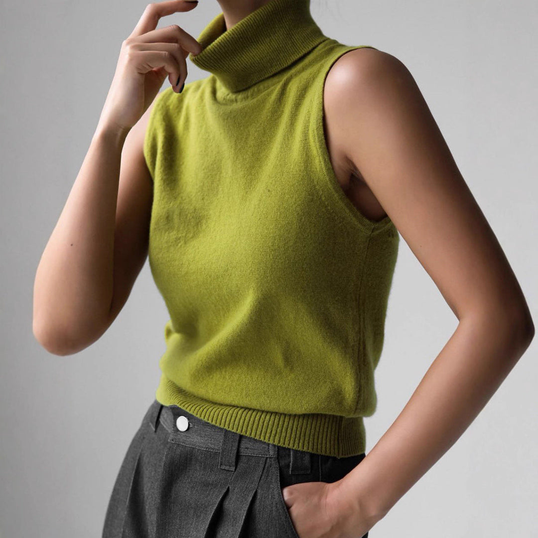 Model wearing a stylish women's turtleneck sweater in a winter setting.