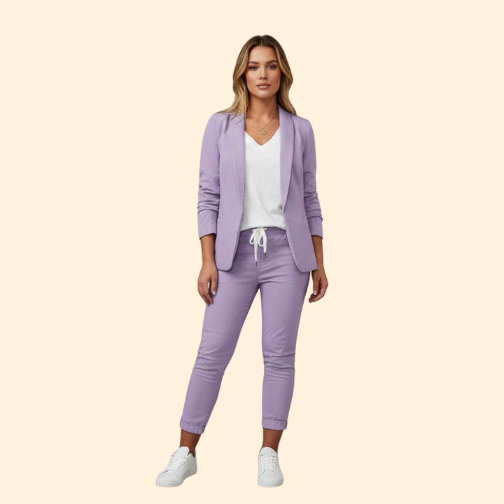 Chic women's blazer and drawstring pant set. Elegant two-piece for versatile fashion, office, or everyday style.