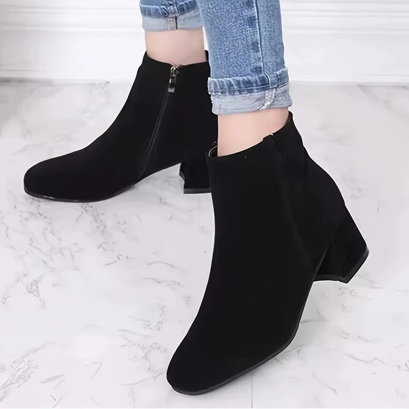 Versatile women's block heel ankle boots with side zip. Comfortable & elegant for all-day wear.