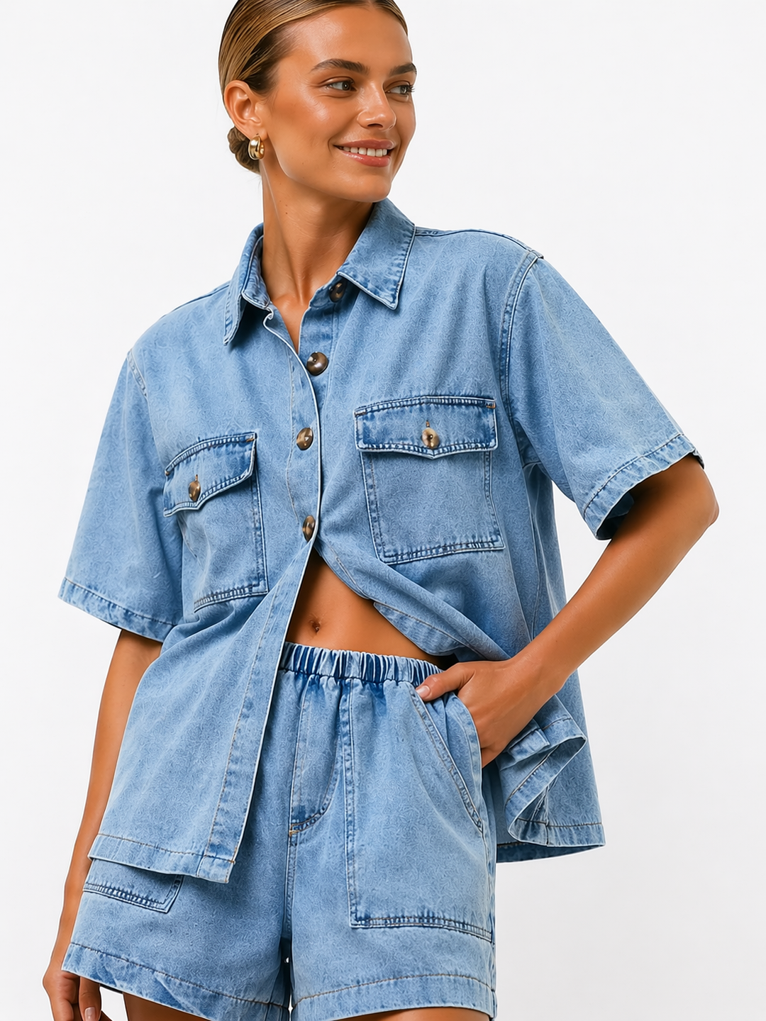 Lightweight blue women's two-piece set with a relaxed shirt and high-waist shorts, perfect for summer comfort.